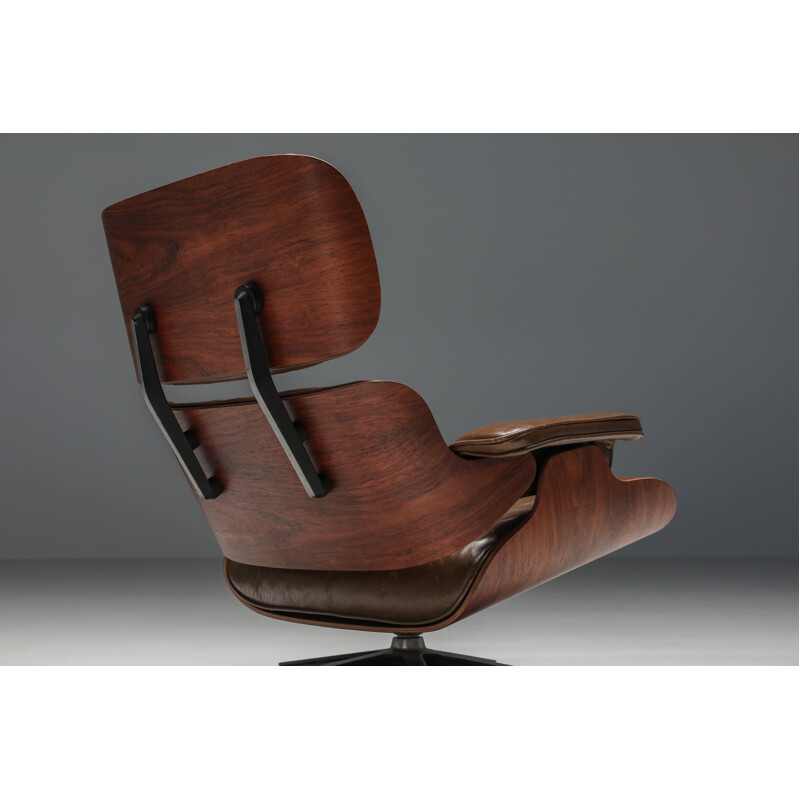 Vintage armchair with ottoman in brown by Eames for Herman Miller, 1960s