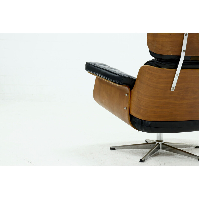 Vintage teak and black skai armchair by Martin Stoll for Giroflex, Switzerland 1960s