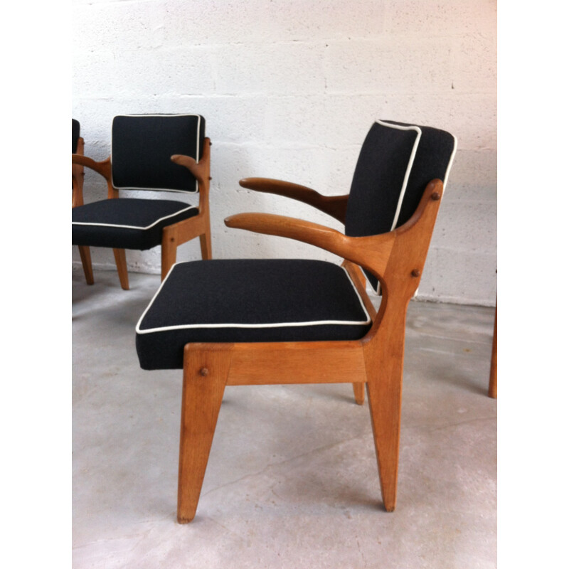 Set of 4 armchairs in oakwood, GUILLERME & CHAMBRON - 1950s