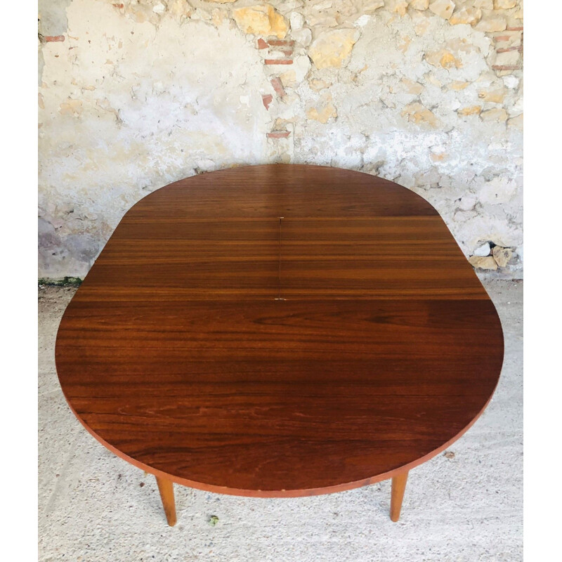 Extendable teak dining table with butterfly extensions, 1960