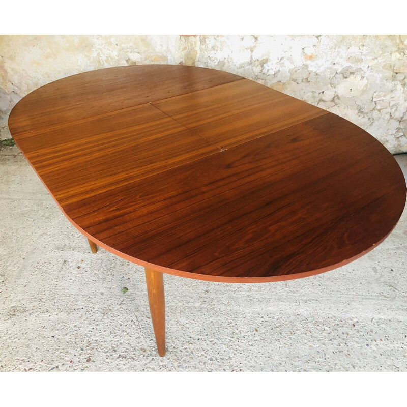 Extendable teak dining table with butterfly extensions, 1960