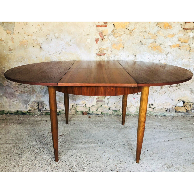Extendable teak dining table with butterfly extensions, 1960