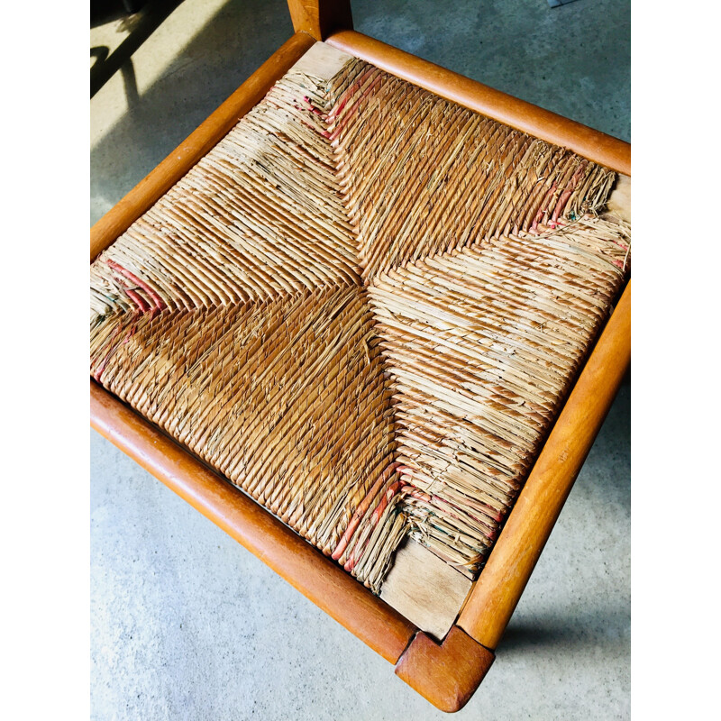 Pair of vintage wood and straw chairs by Pierre Cruège