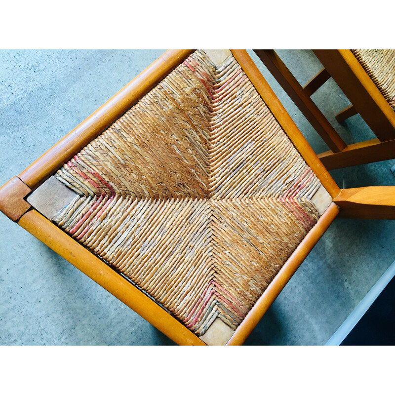 Pair of vintage wood and straw chairs by Pierre Cruège