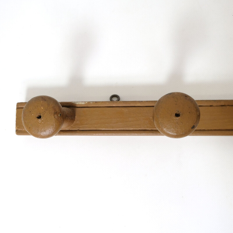 Vintage wooden coat rack with 5 pegs