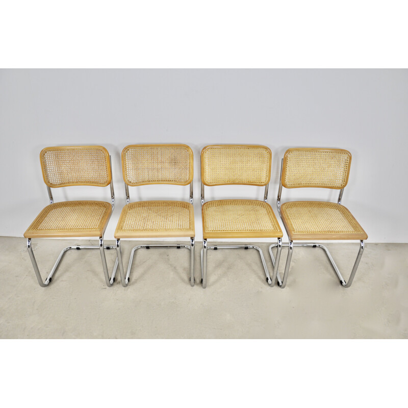 Set of 4 vintage chairs in wood caning and metal