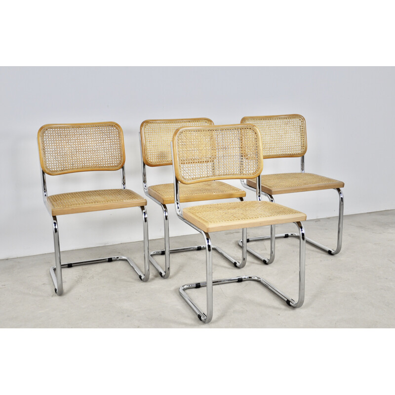 Set of 4 vintage chairs in wood caning and metal