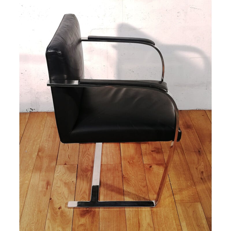 Fauteuil vintage en acier chromé et en cuir noir