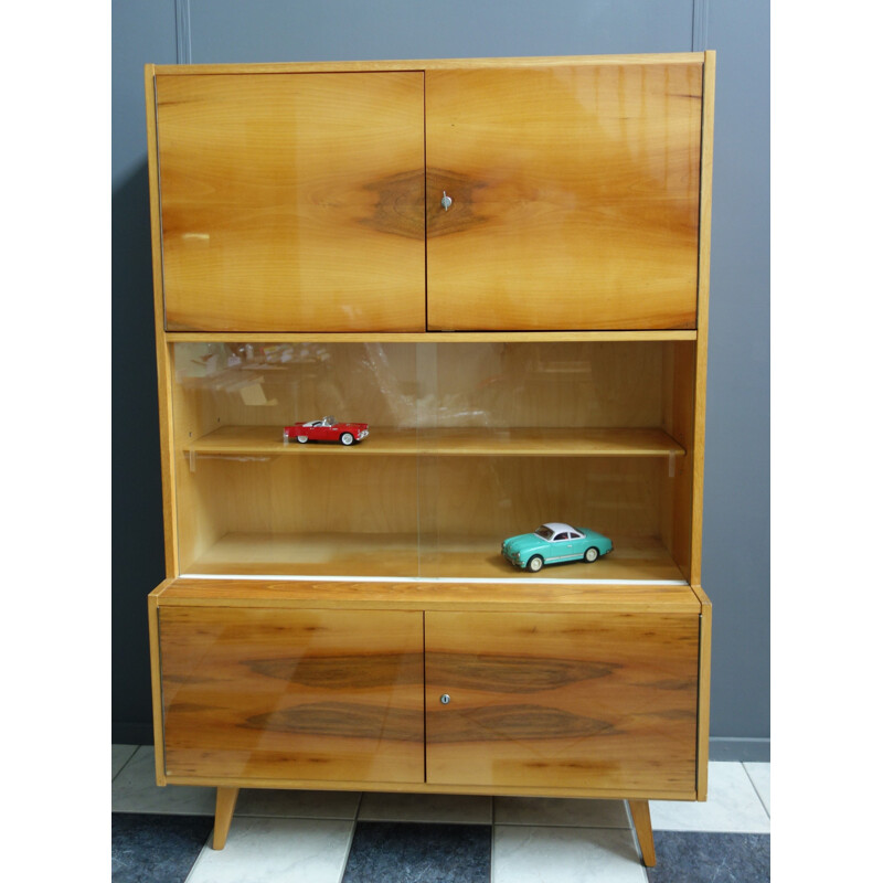 Vintage blond wood sideboard with 2 sliding glass doors by Trud Czech, 1960