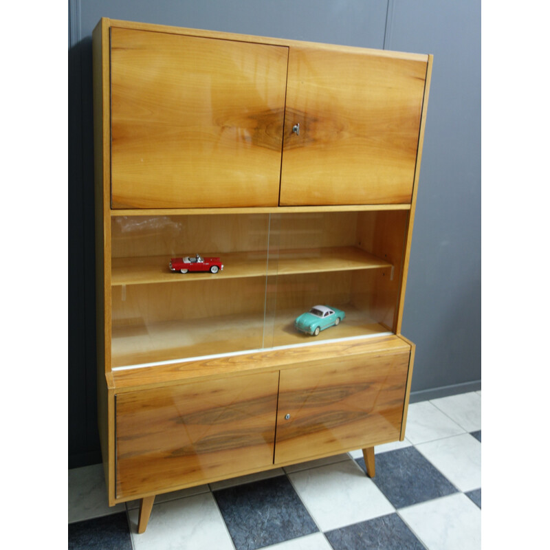 Vintage blond wood sideboard with 2 sliding glass doors by Trud Czech, 1960