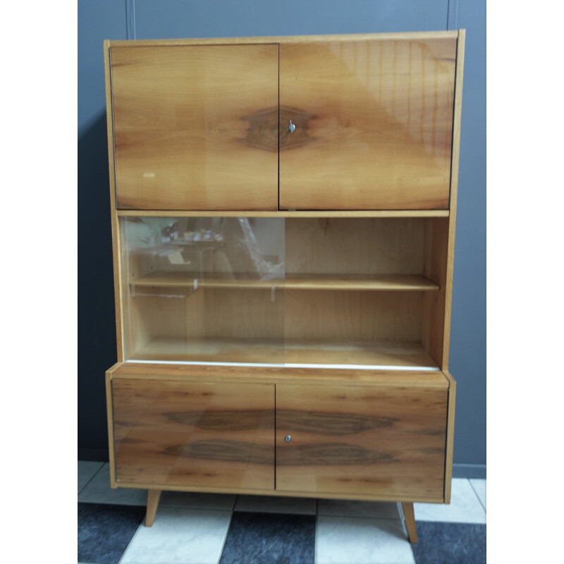 Vintage blond wood sideboard with 2 sliding glass doors by Trud Czech, 1960