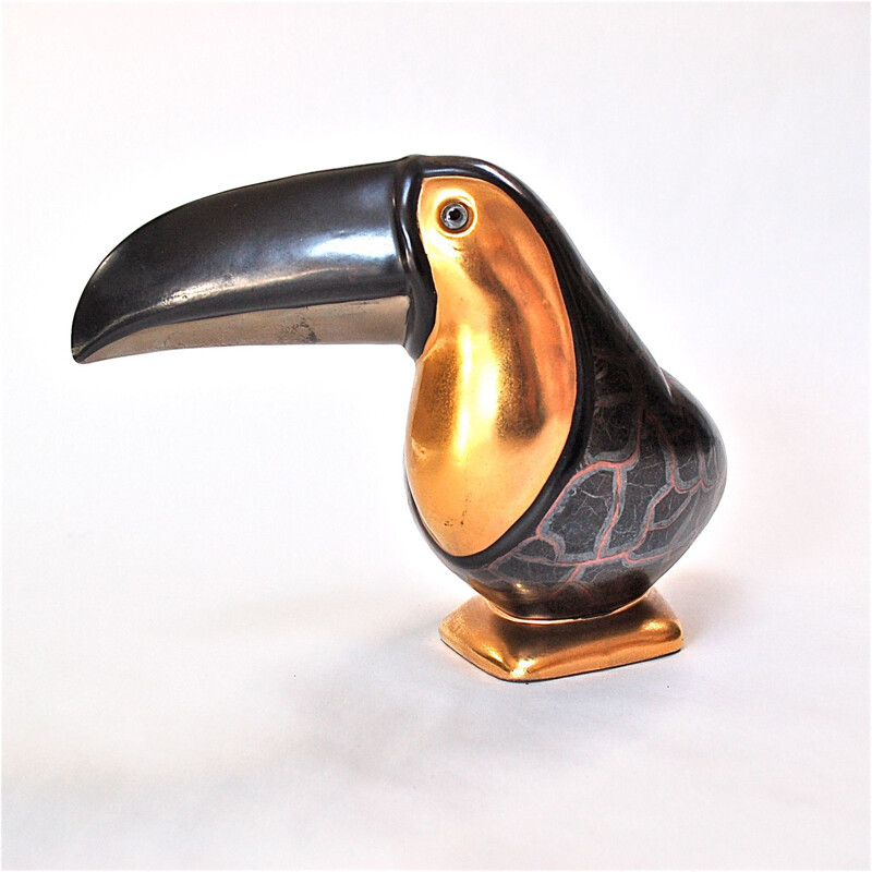 Black and gold vintage ceramic toucan