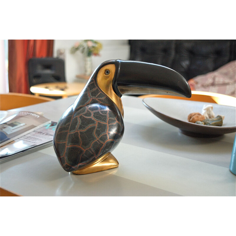 Black and gold vintage ceramic toucan