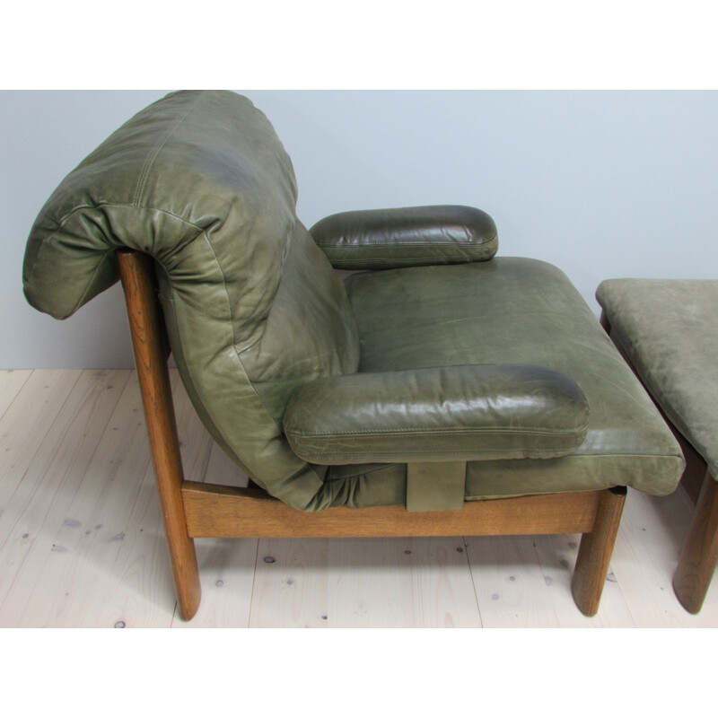 Vintage leather armchair and footrest, 1960s