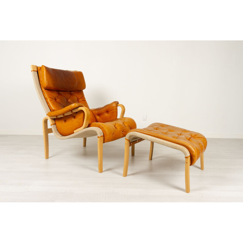 Scandinavian vintage armchair and ottoman by Nielaus & Jeki Møbler, 1980s