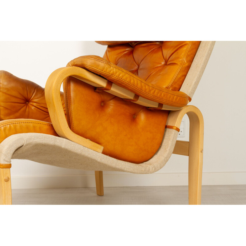 Scandinavian vintage armchair and ottoman by Nielaus & Jeki Møbler, 1980s