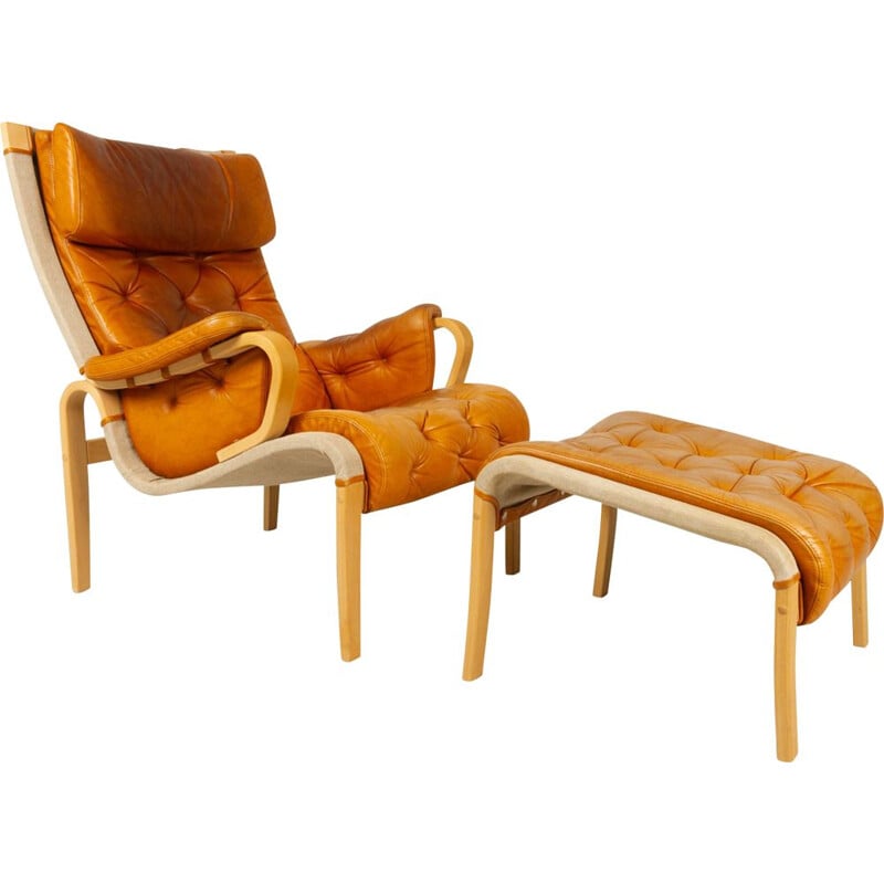 Scandinavian vintage armchair and ottoman by Nielaus & Jeki Møbler, 1980s