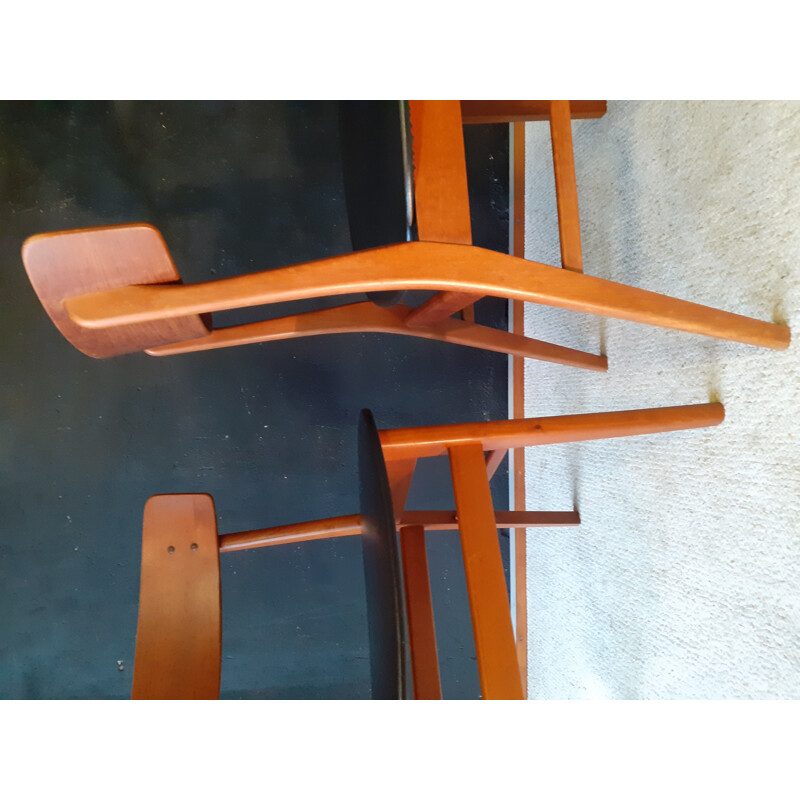 Pair of vintage Danish chairs in wood and black leatherette