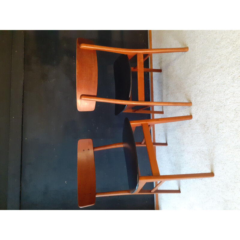 Pair of vintage Danish chairs in wood and black leatherette