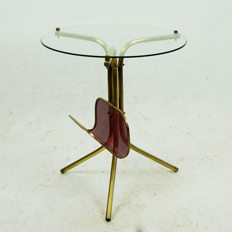 Italian mid century circular brass and glass side table with magazine rack, 1950s