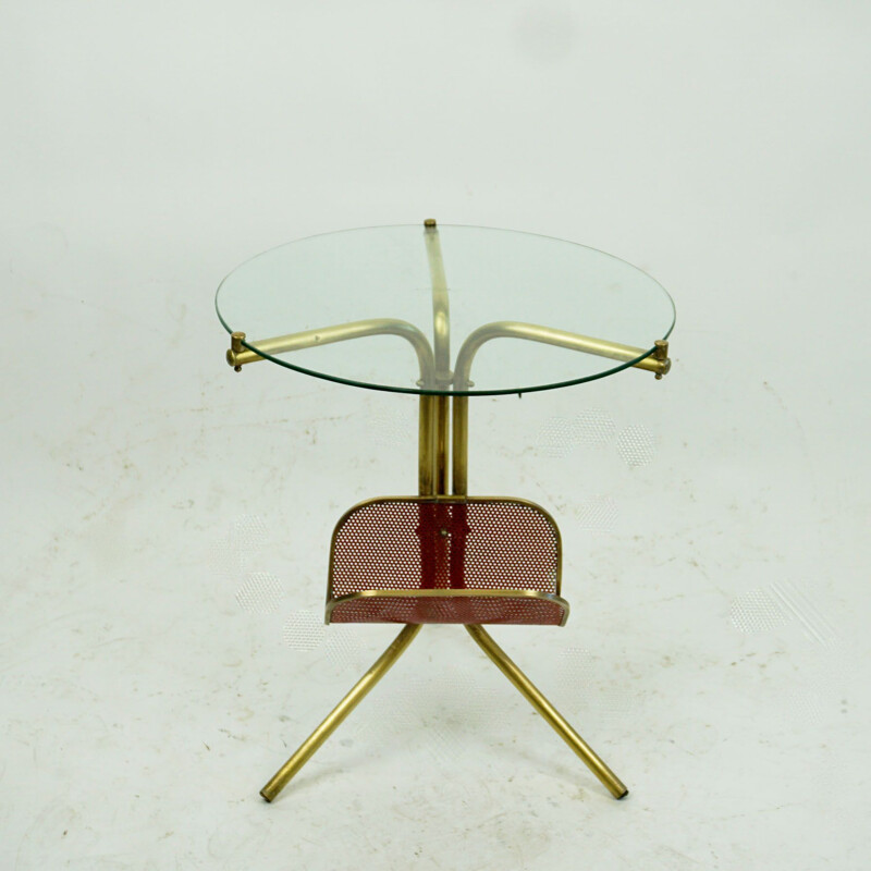 Italian mid century circular brass and glass side table with magazine rack, 1950s