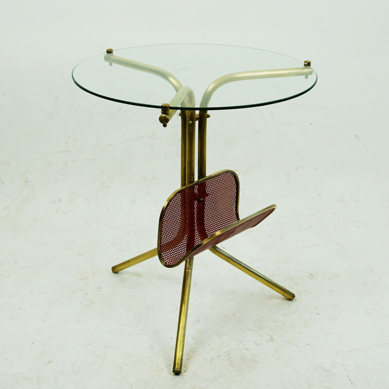 Italian mid century circular brass and glass side table with magazine rack, 1950s