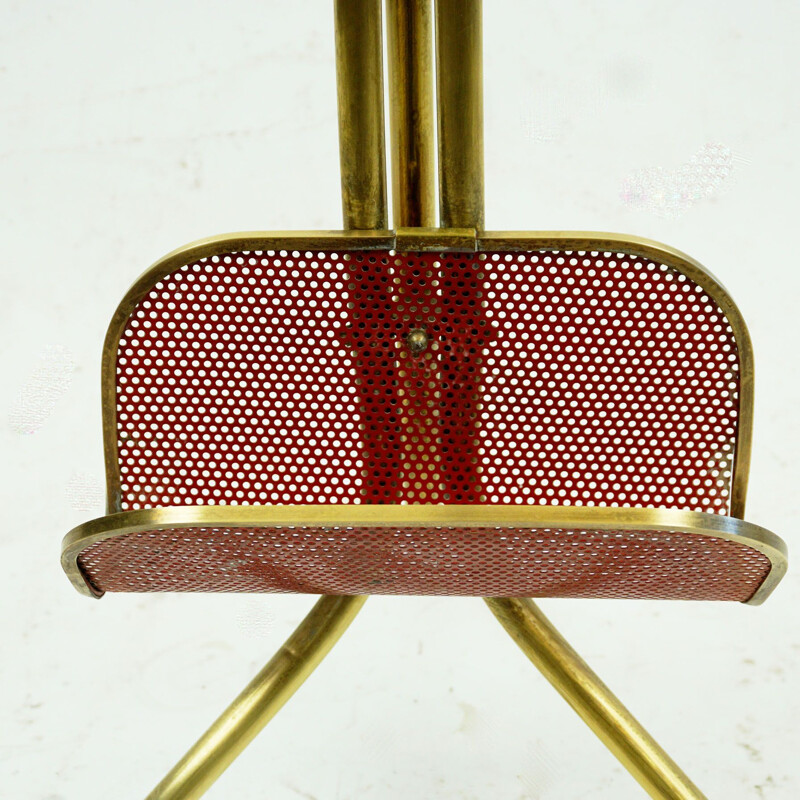 Italian mid century circular brass and glass side table with magazine rack, 1950s