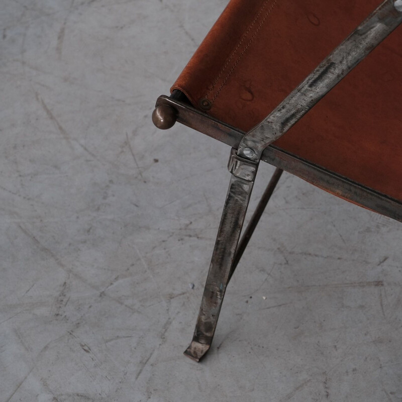 Pair of vintage folding armchairs in leather and metal, France 1950