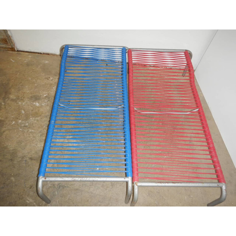 Pair of vintage lounge chairs in aluminum and plastic