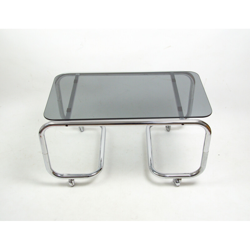 Vintage smoked glass coffee table on casters, 1970