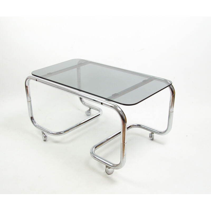 Vintage smoked glass coffee table on casters, 1970