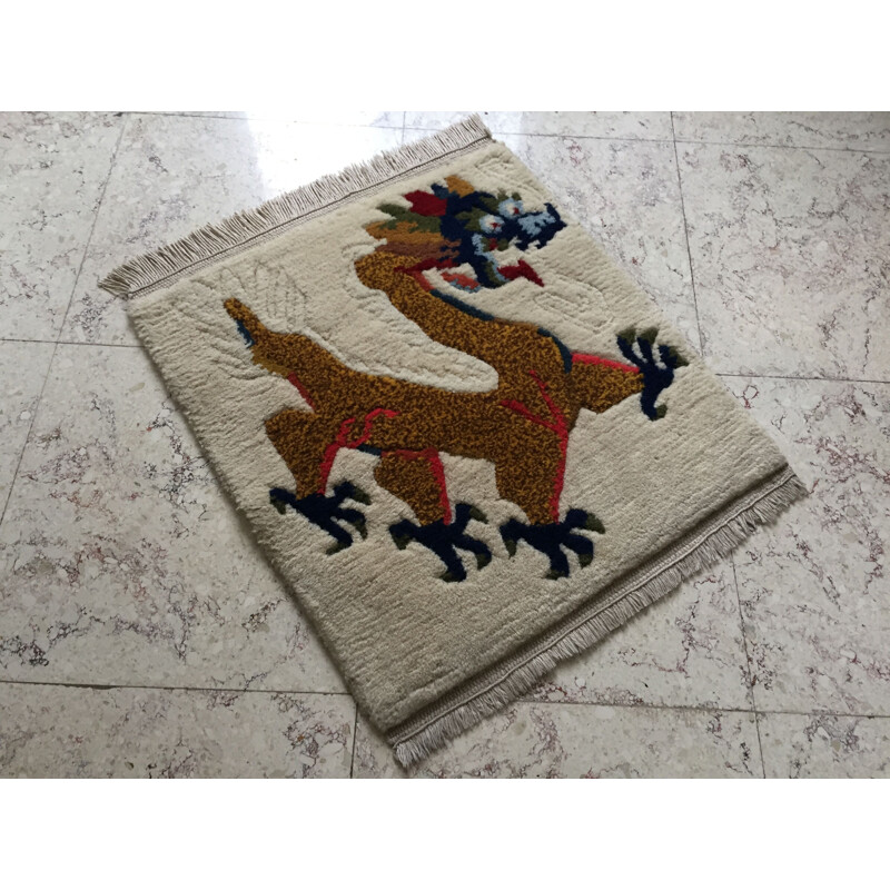 Vintage Tibetan wool rug with dragon design, 1960