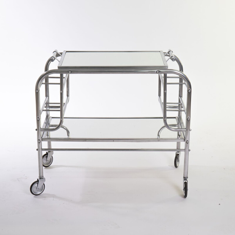 Vintage art deco bar cart in polished aluminum and tempered glass, 1930