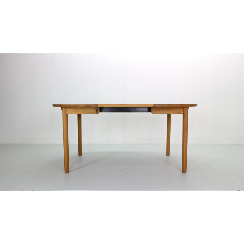 Vintage round oakwood extendable dining table by Hans J. Wegner for Ry Mobler, Denmark 1970
