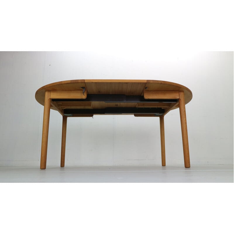 Vintage round oakwood extendable dining table by Hans J. Wegner for Ry Mobler, Denmark 1970