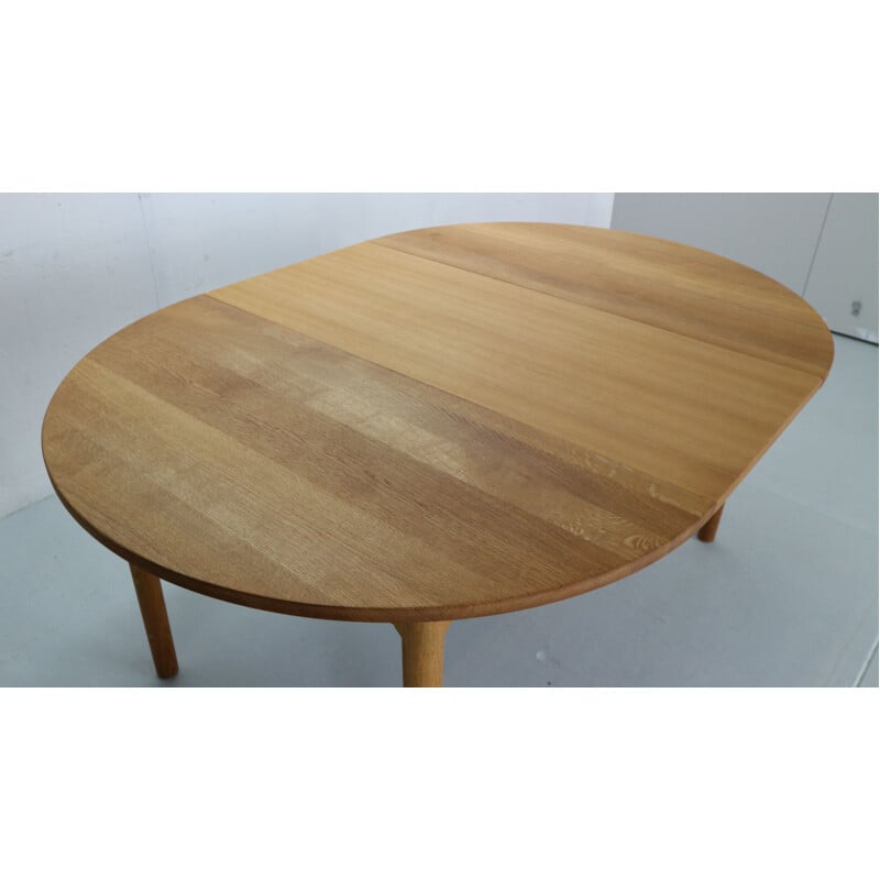 Vintage round oakwood extendable dining table by Hans J. Wegner for Ry Mobler, Denmark 1970