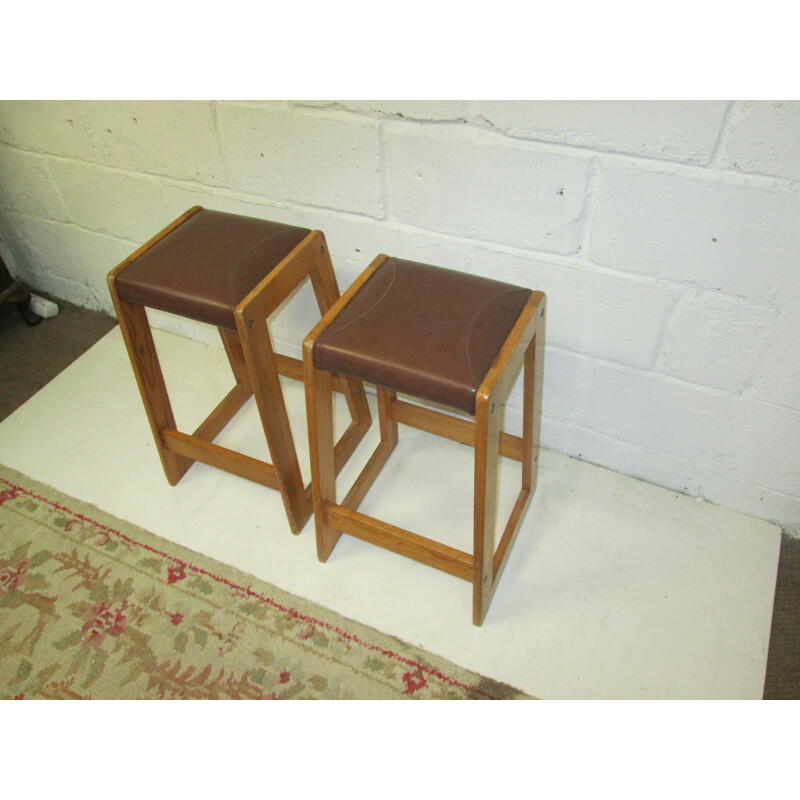 Pair of vintage pine and leatherette stools