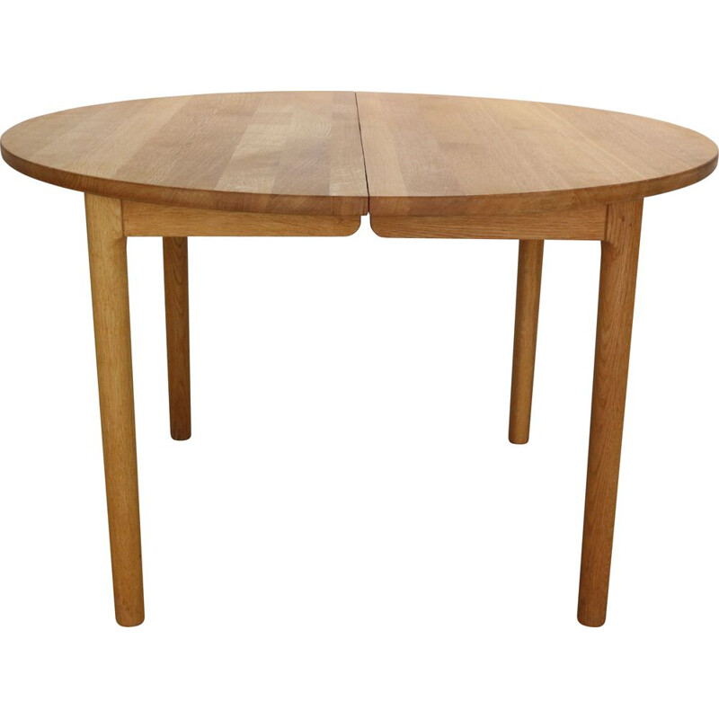 Vintage round oakwood extendable dining table by Hans J. Wegner for Ry Mobler, Denmark 1970