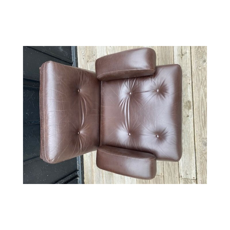 Vintage chocolate color leather armchair 1970