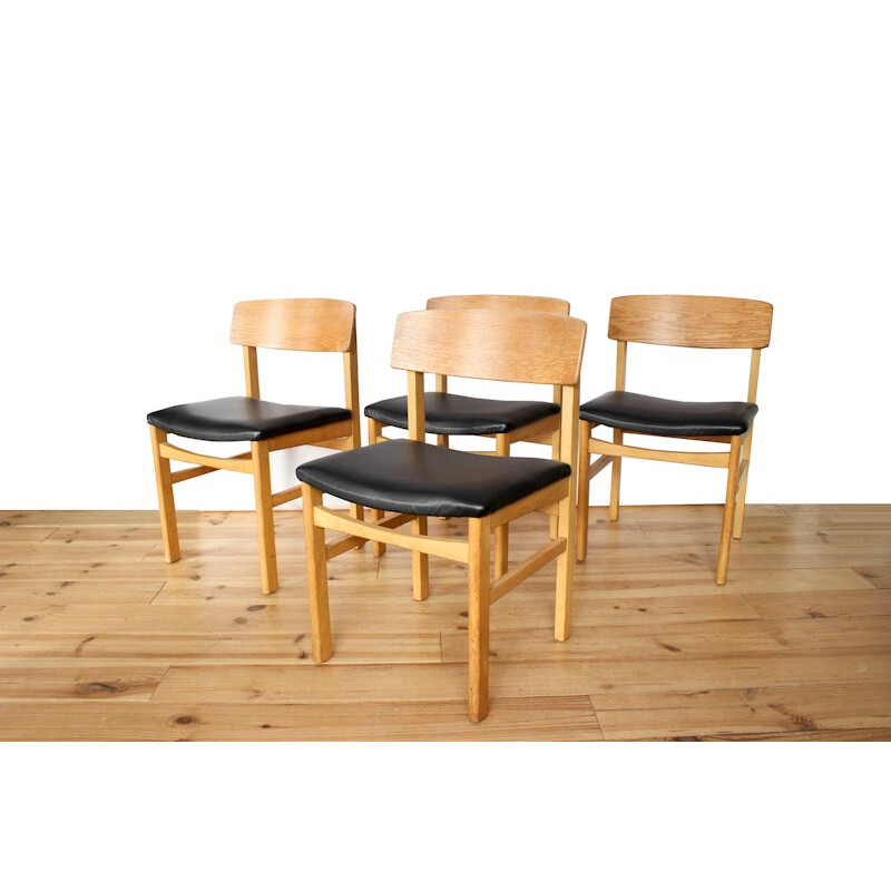 Ensemble de 4 chaises à repas en chêne et simili cuir noir - 1960