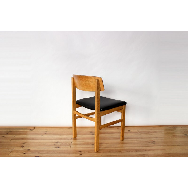 Set of 4 dining chairs in oak and black leatherette - 1960s