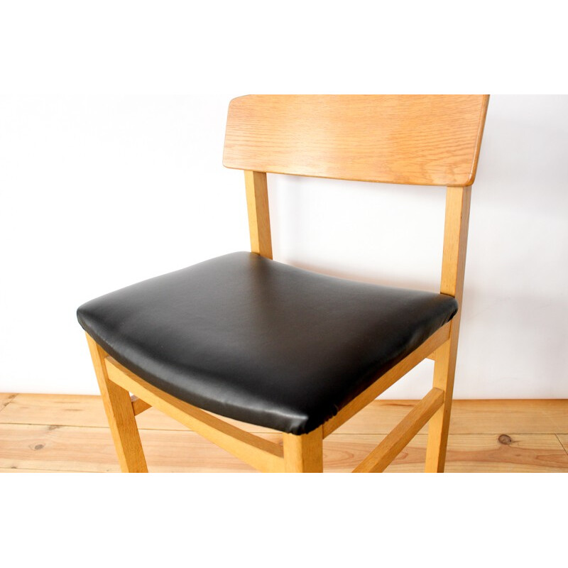 Set of 4 dining chairs in oak and black leatherette - 1960s