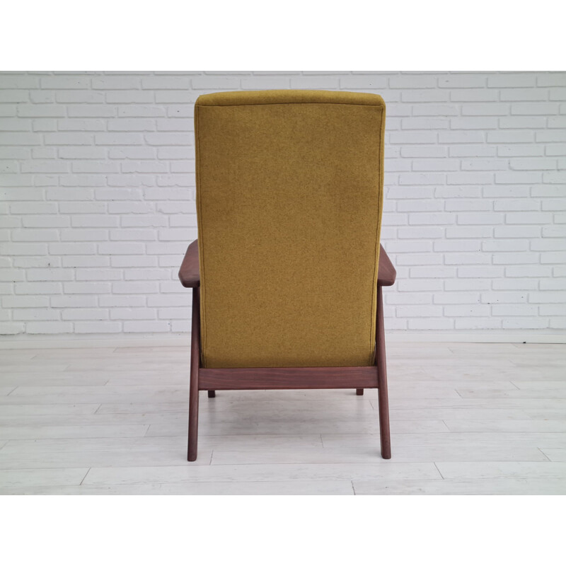 Mid-century danish high-backed armchair with fold-out footrest, 1970