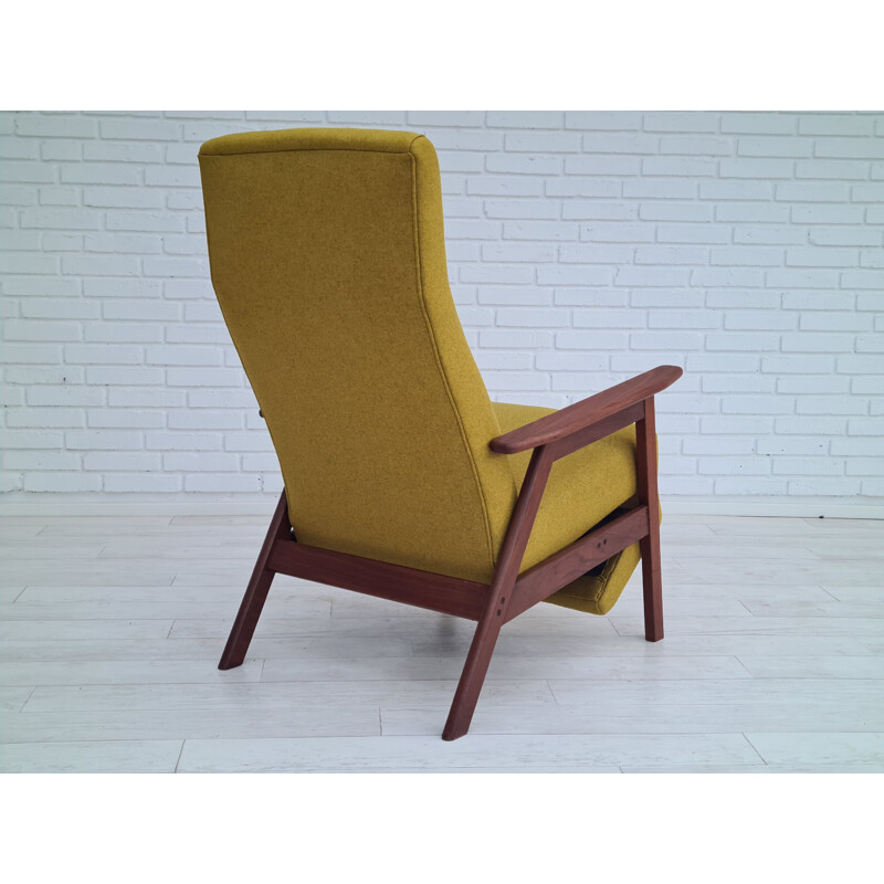 Mid-century danish high-backed armchair with fold-out footrest, 1970