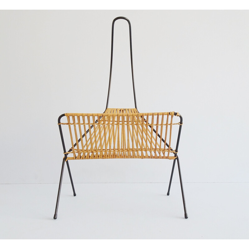 Vintage metal and rattan magazine rack in the shape of a rope