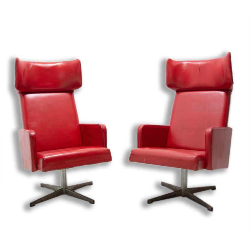 Pair of mid century Czechoslovak red swivel armchairs, 1970s