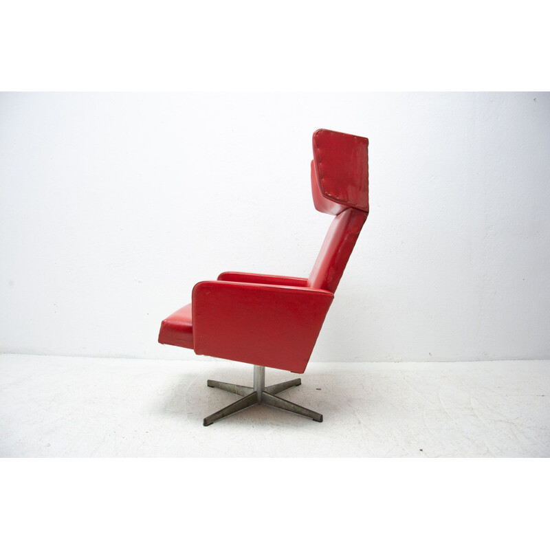 Pair of mid century Czechoslovak red swivel armchairs, 1970s