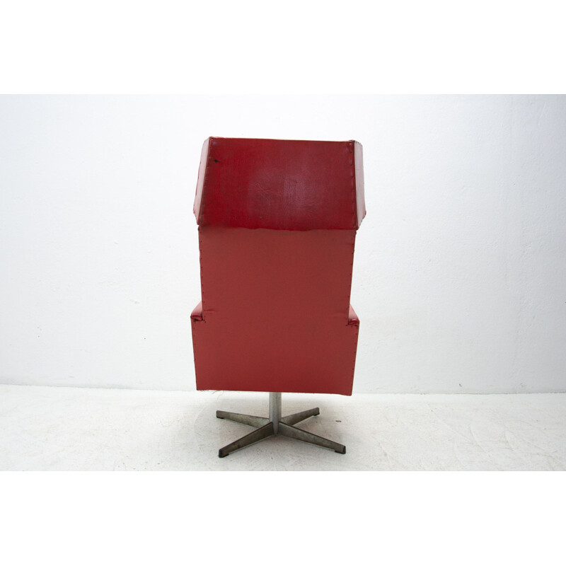 Pair of mid century Czechoslovak red swivel armchairs, 1970s