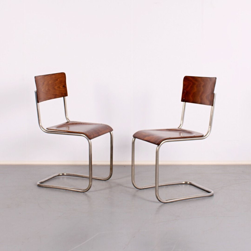 Pair of vintage tubular dining chairs by Mart Stam