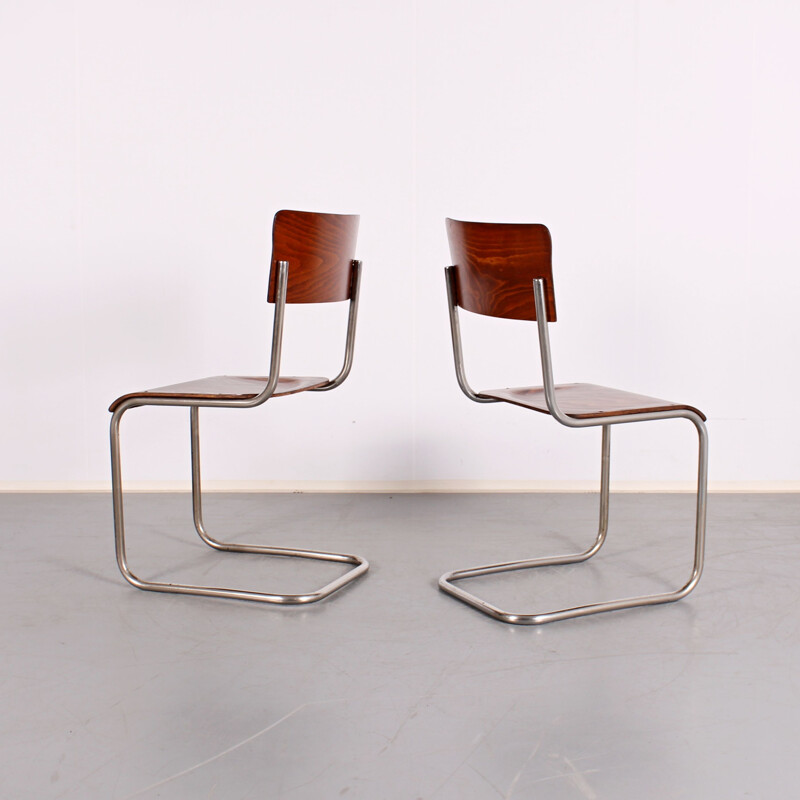 Pair of vintage tubular dining chairs by Mart Stam